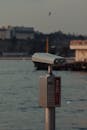 Coin Operated Binoculars Near Body of Water