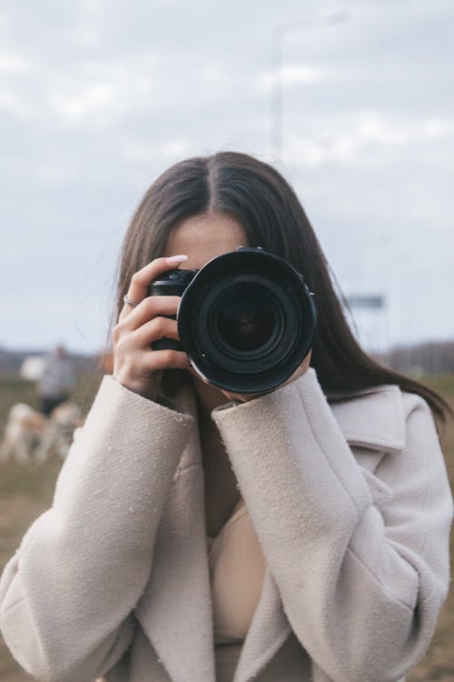 Woman Using DSLR Camera