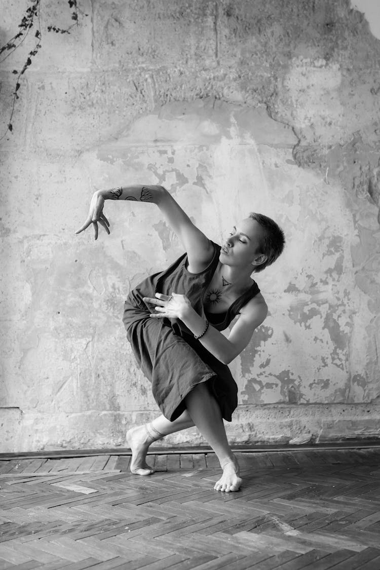 Woman With Short Hair In Dance Pose