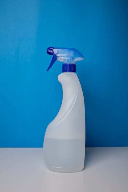 Fotos de stock gratuitas de botella de plástico, botella de spray, contenedor de plástico