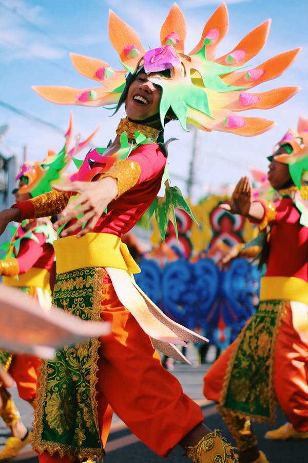 Shallow Focus Photography of Person Wearing Multicolored Costume