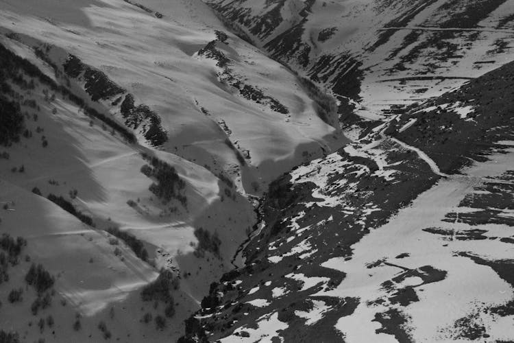 Snow On Hill And In Valley In Black And White