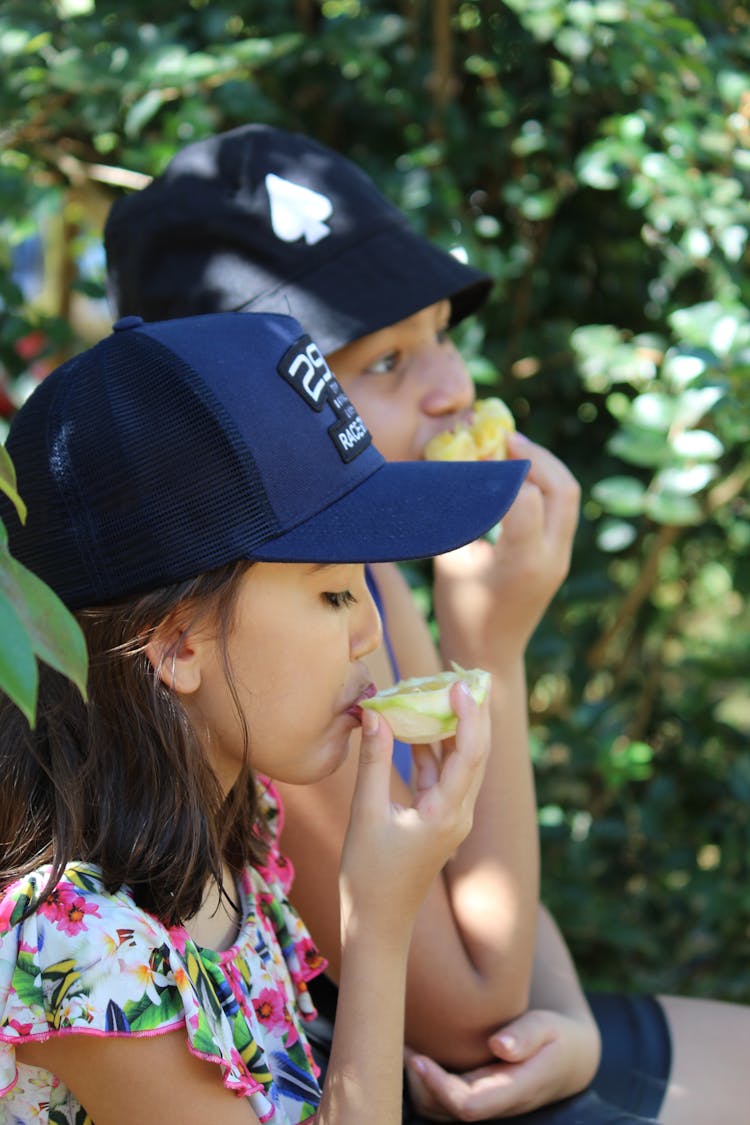 Children Sitting And Eating