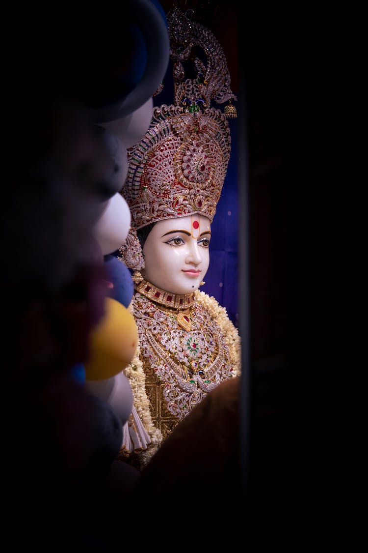 Statue Of God In Ornamented Crown And With Jewelry