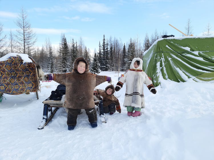 Children In Coats In Snow