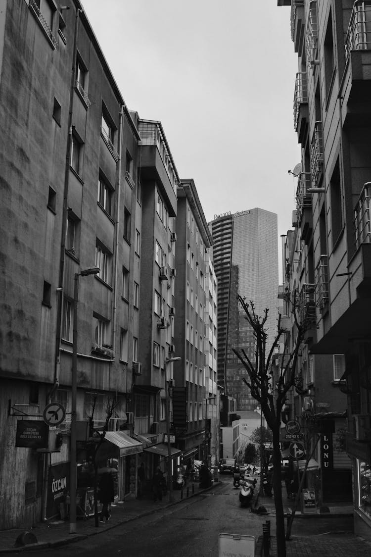 Grayscale Photo Of Apartment Buildings