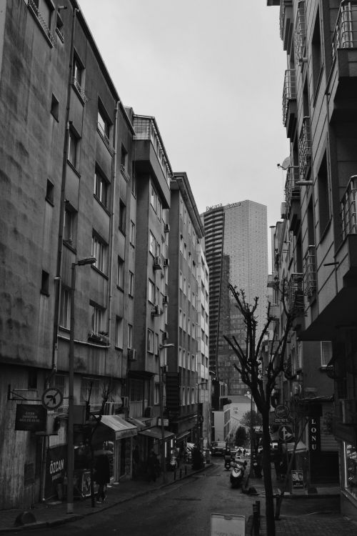 Free Monochrome street scene in Istanbul with apartment and high-rise buildings on a rainy day. Stock Photo