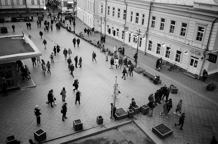 Pedestrians On City Square