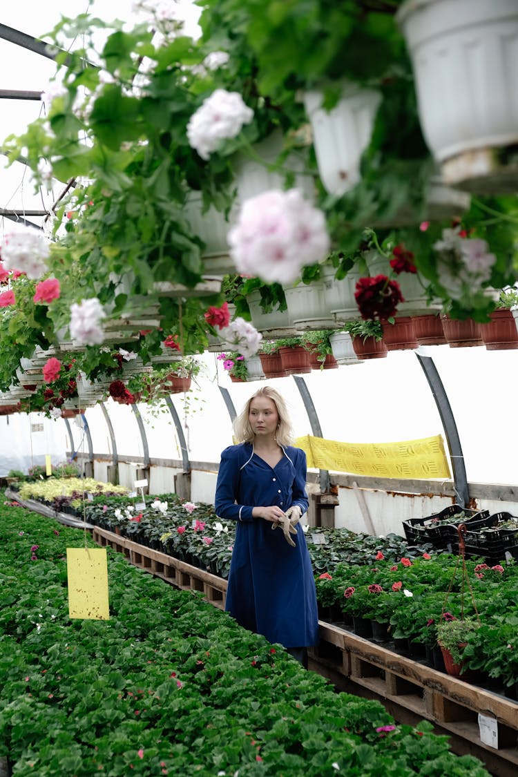 Woman In Greenhouse