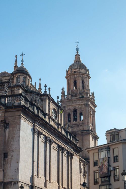 Free Explore the stunning Renaissance architecture of Jaén Cathedral in an urban setting with a clear sky. Stock Photo