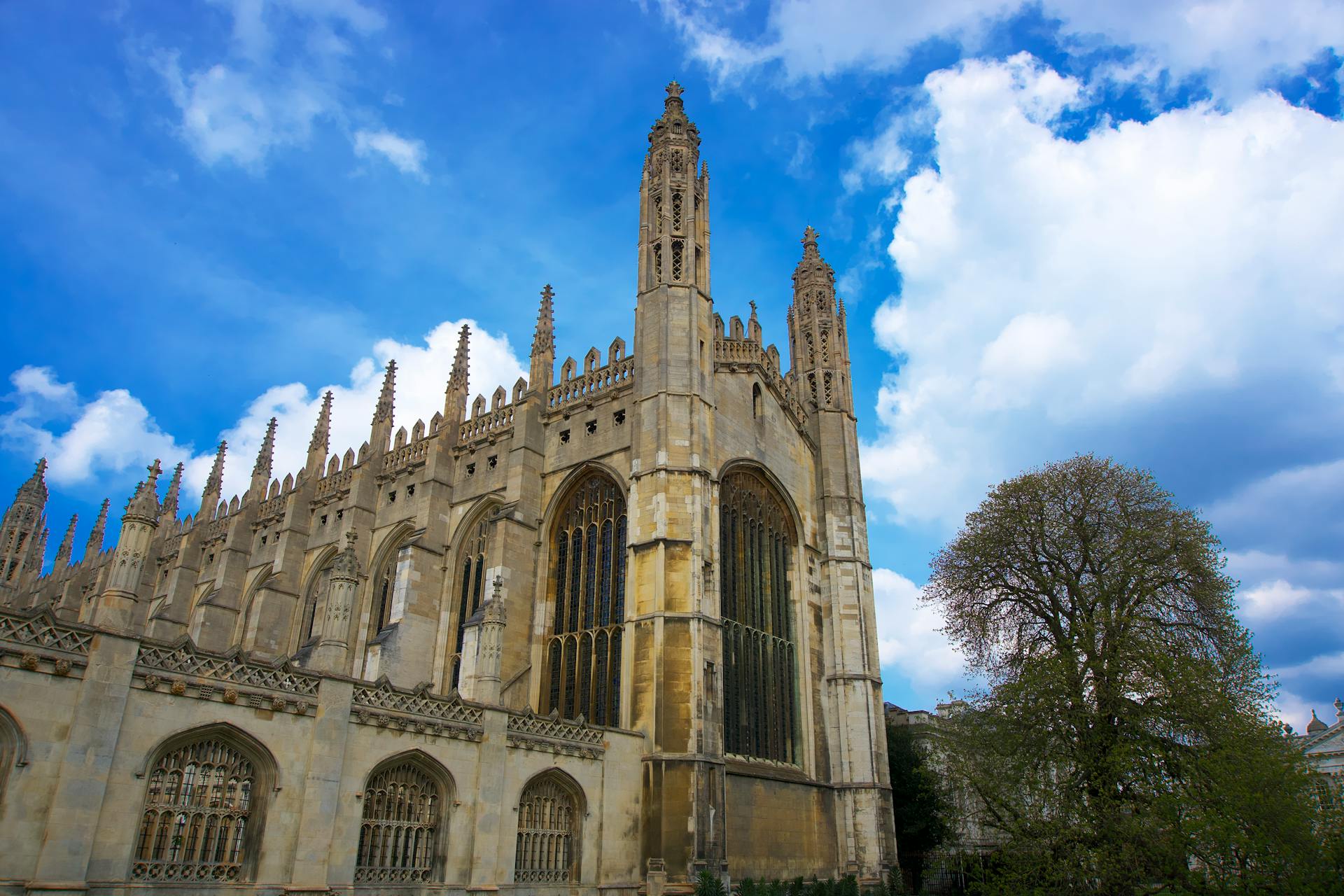 Impressive view of King's College Chapel, Cambridge with a vibrant blue sky backdrop.