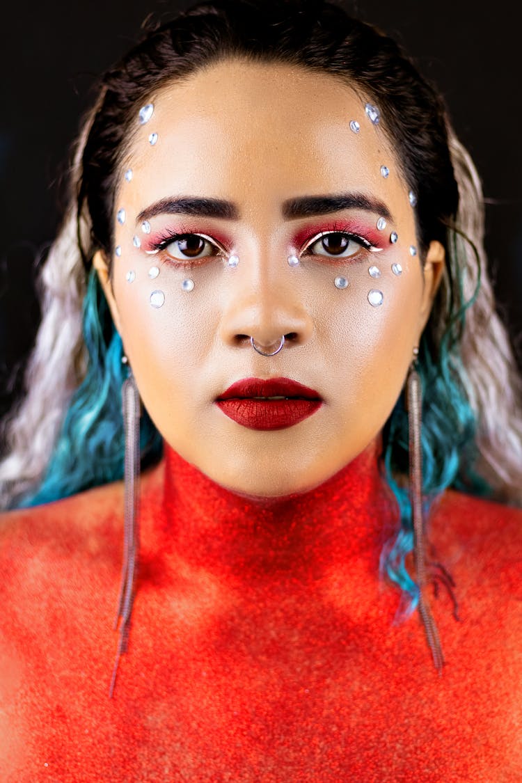 Portrait Of Woman In Colorful Hair With Crystals Decorating Face