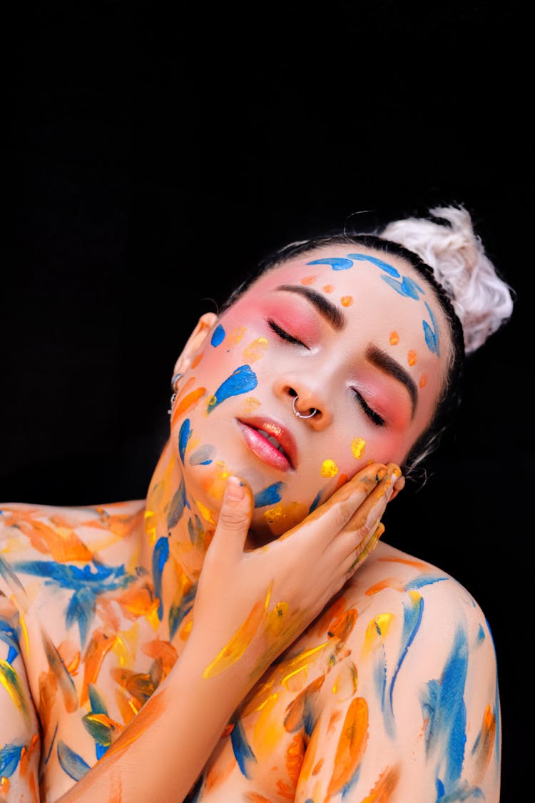 Portrait Of Woman With Body And Face Painted