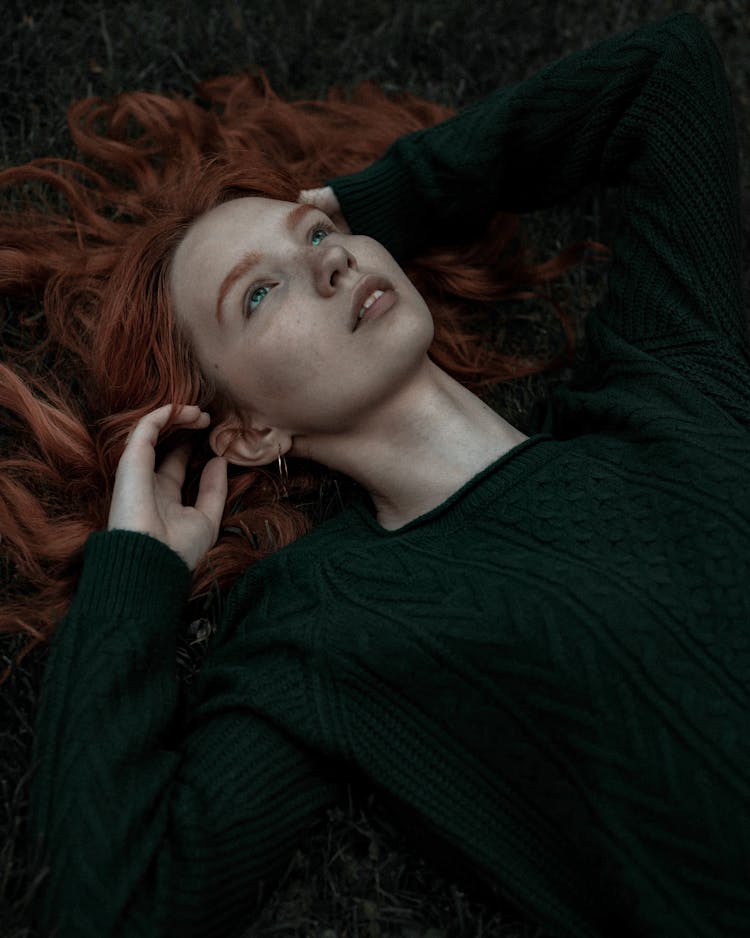 Lying Girl With Long Red Hair