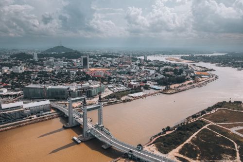 Free Stunning aerial view of the iconic Kuala Terengganu Drawbridge over the Terengganu River, Malaysia. Stock Photo