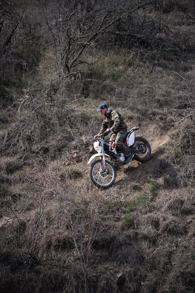 Man Riding Motorcycle Off Road