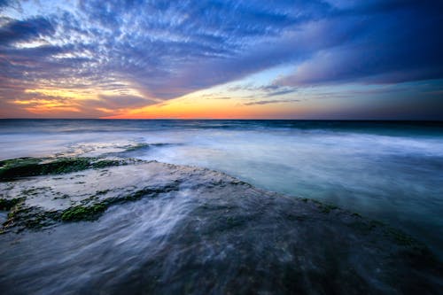 Gratis lagerfoto af aften, bølger, dramatisk himmel