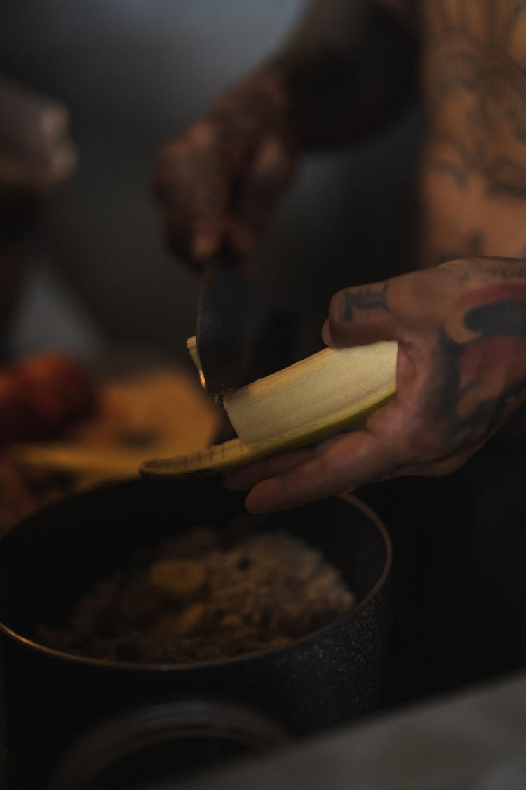 Person Slicing Banana 