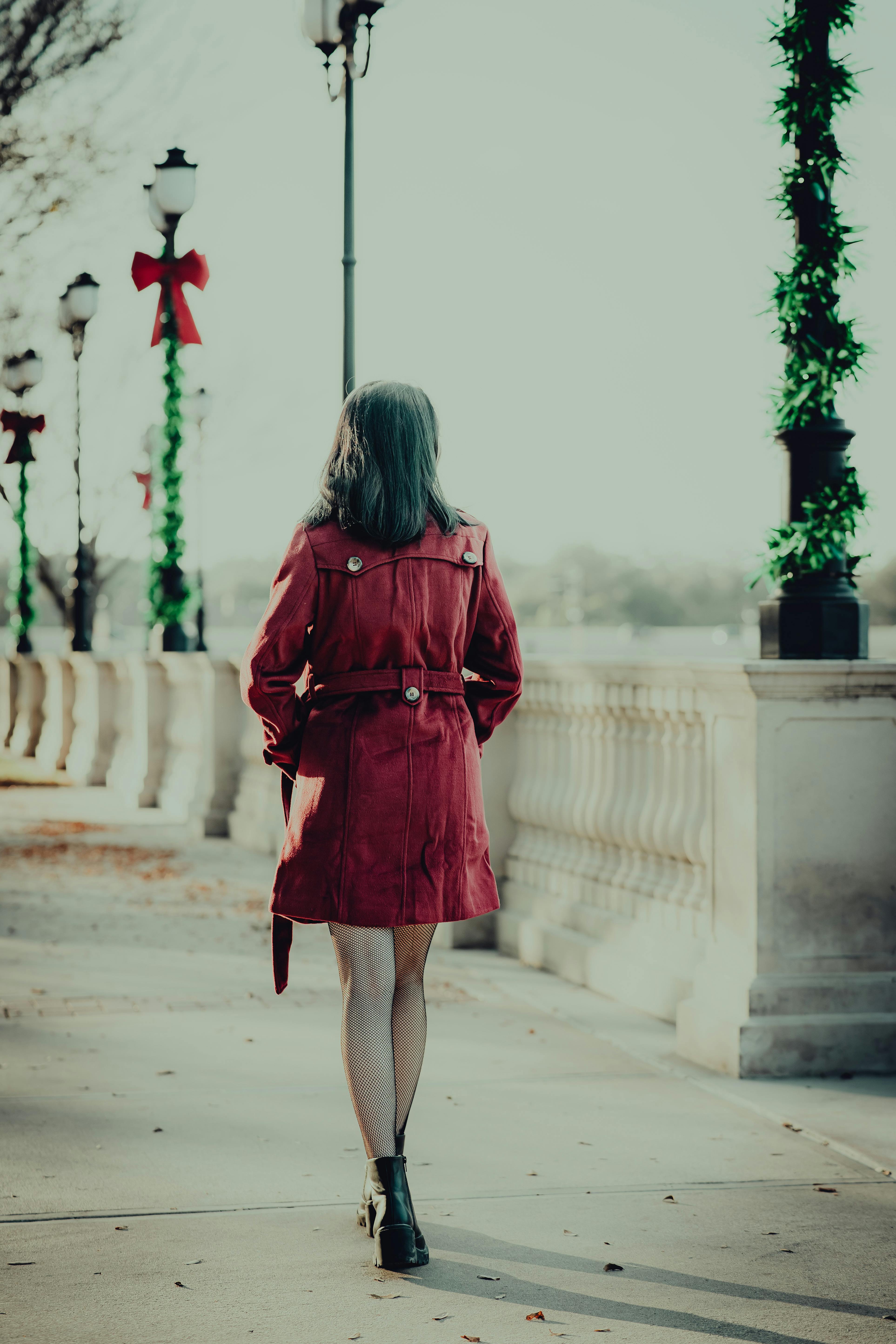 Person in Red Pants and Pair of Black Heeled Boots · Free Stock Photo