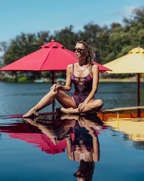 Woman in Violet Swimsuit