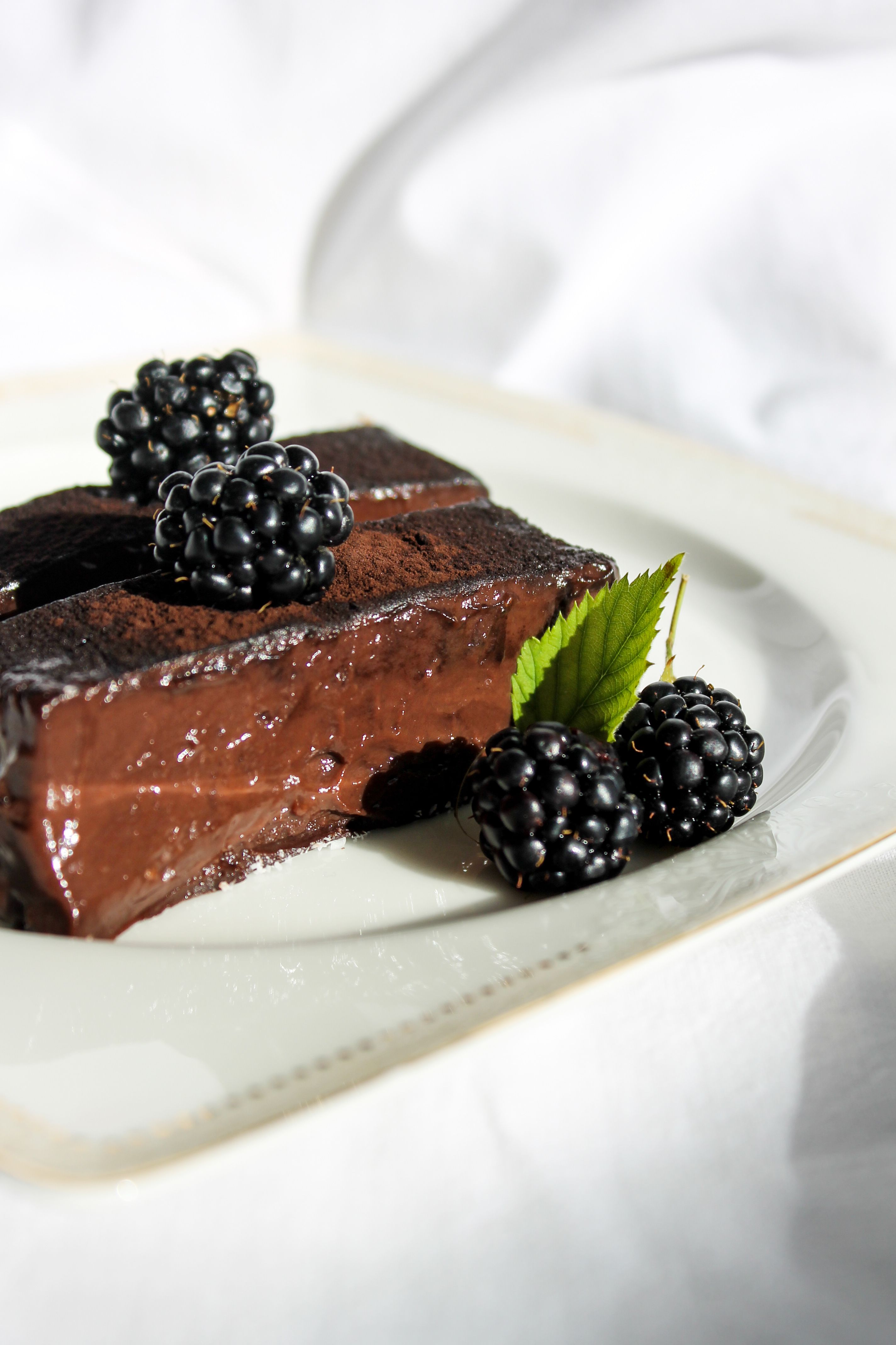 Close-Up Photo of Chocolate Cake with Blueberries · Free Stock Photo