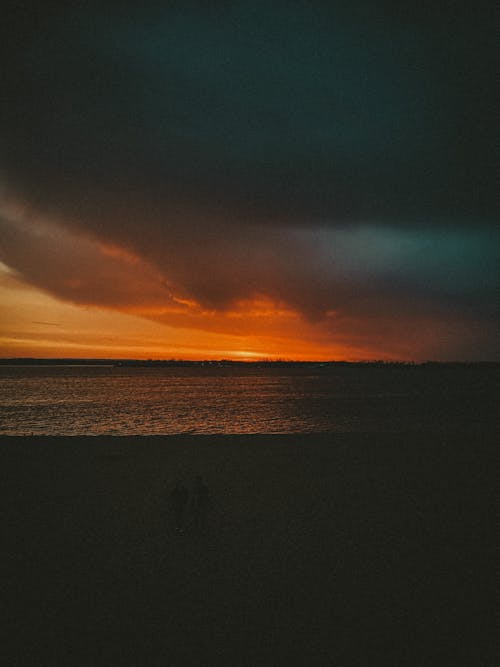 Photograph of a Beach during Sunset