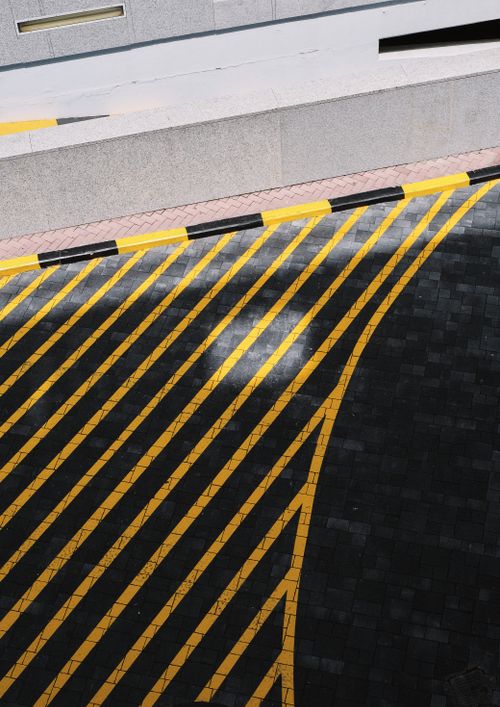 Free Aerial view of road markings in Dubai, showcasing urban architecture and design. Stock Photo