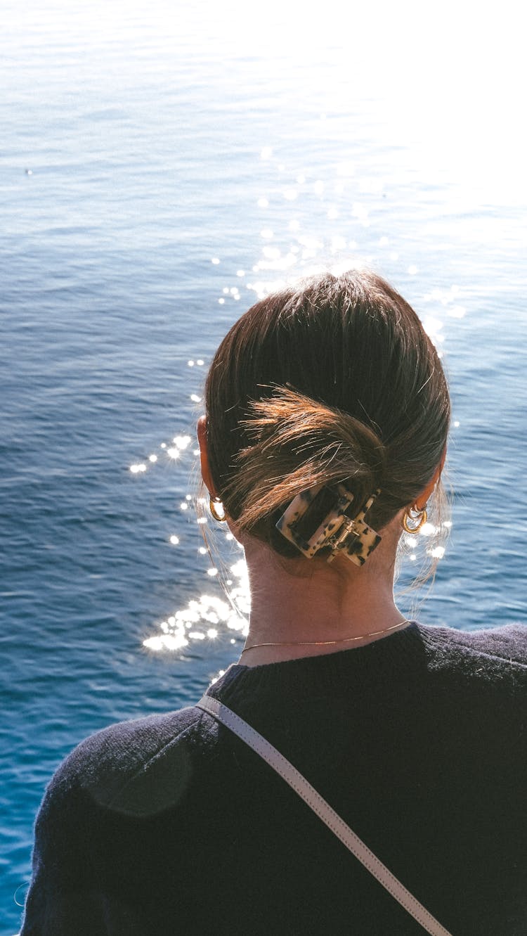 Back View Of A Woman With A Hair Clip