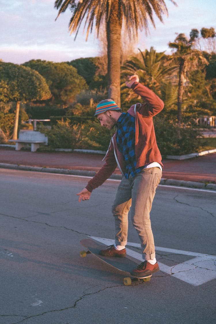 Photo Of A Man Skateboarding