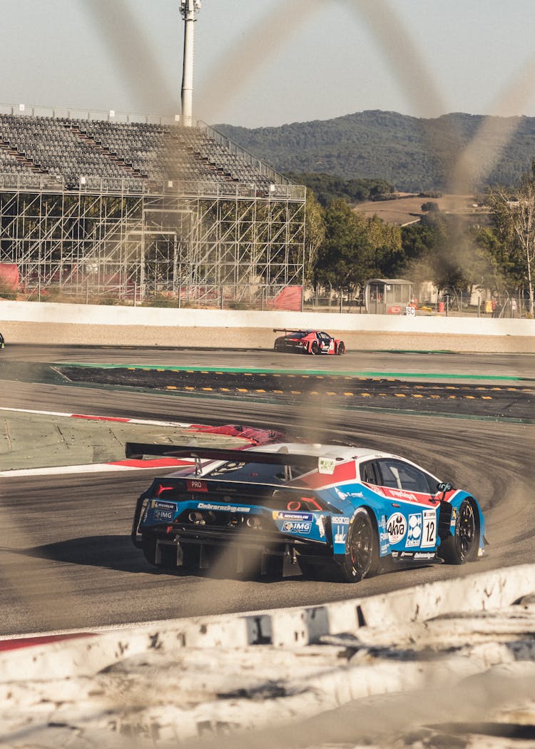 Photograph Of A Blue And Red Racecar