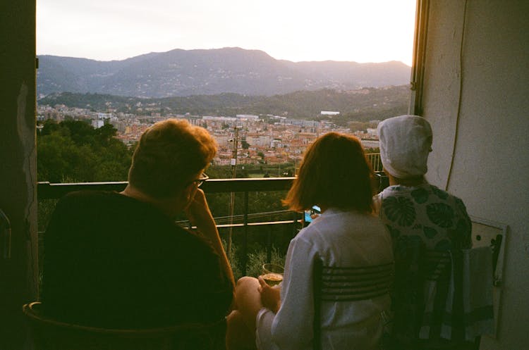 Photo Of A Group Of Friends On A Balcony