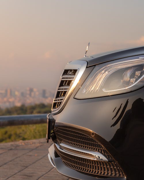 Grills and Bumper of a Black Luxury Car in Close Up Photography