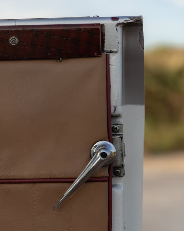 Close Up Of A Knob Of An Open Door Of A Van 