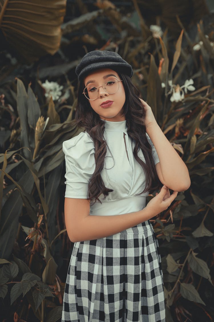 Woman With A Gray Beret Posing