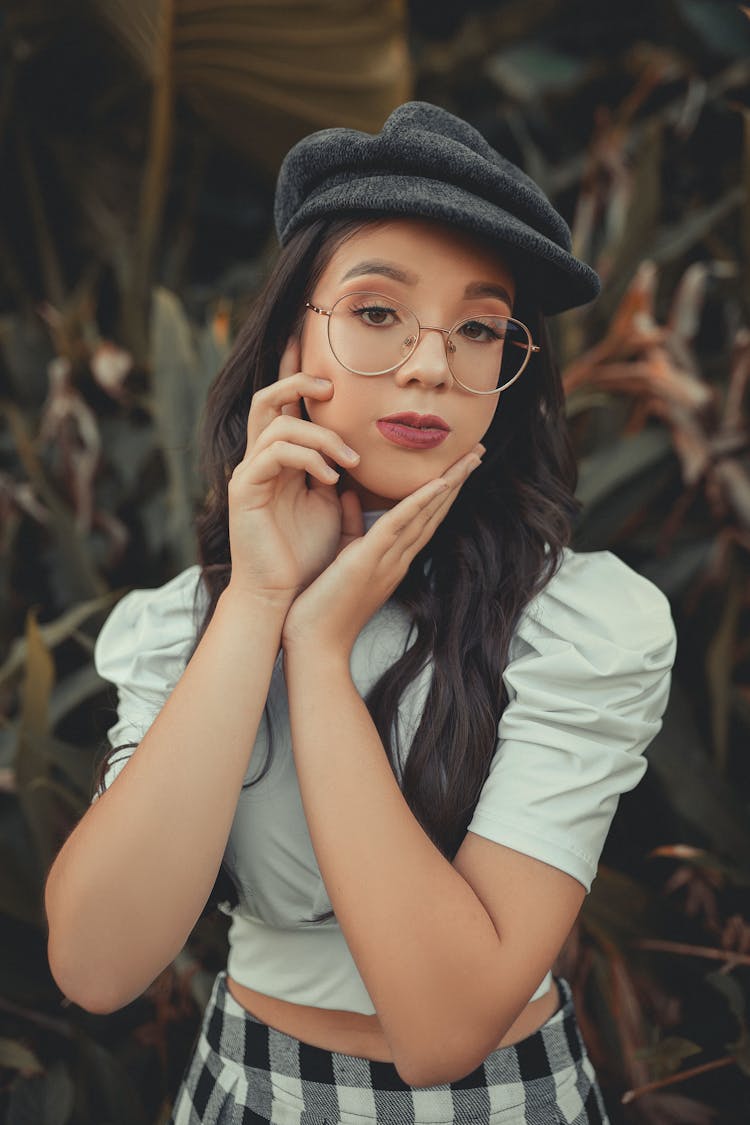 Portrait Of A Woman With Eyeglasses Posing