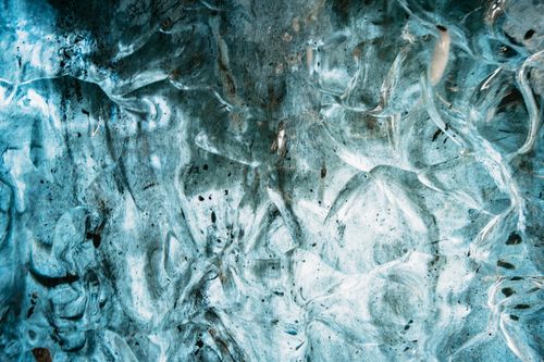 Free Stunning close-up of intricate ice formations in Iceland's caves, showcasing nature's frozen art. Stock Photo