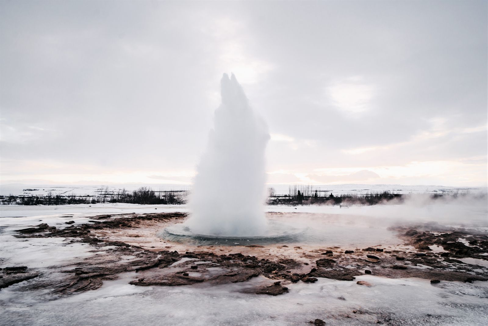 Strokkur geyser eruption Iceland Golden Circle winter