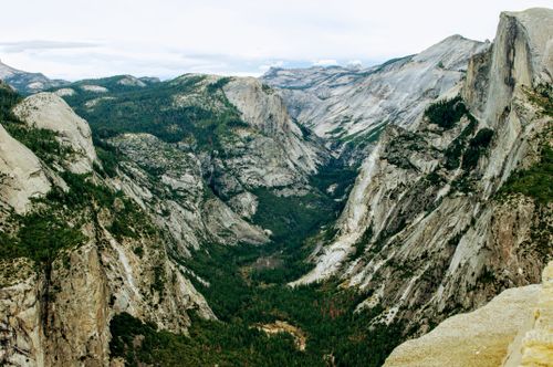 Free Breathtaking aerial view of the rugged cliffs and valley in Yosemite National Park during summer. Stock Photo
