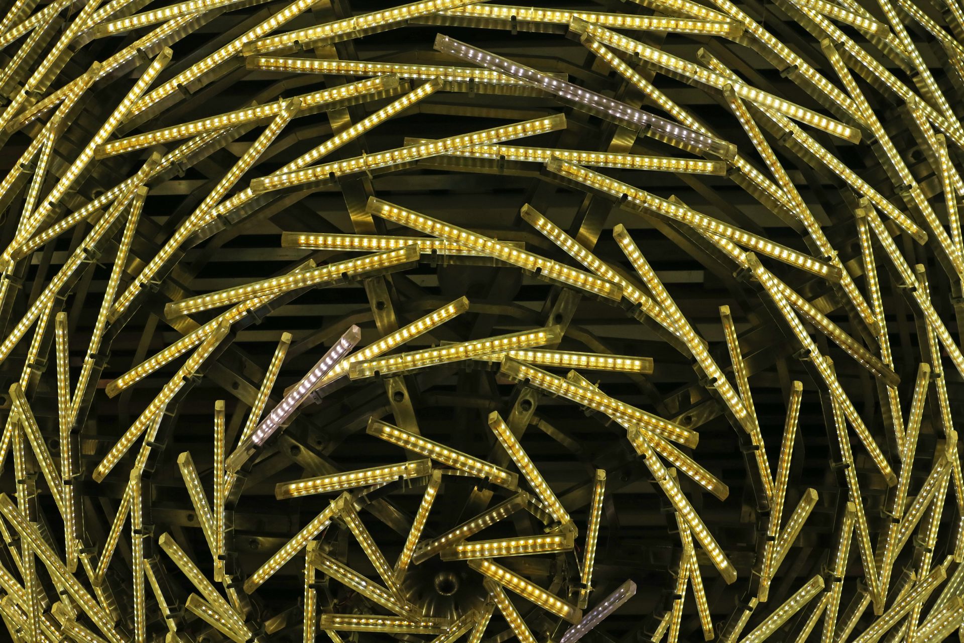 Close-up of a swirling pattern created by multiple LED lights in an abstract arrangement.