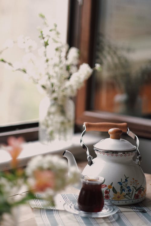 Free Tea and Kettle on a Table  Stock Photo