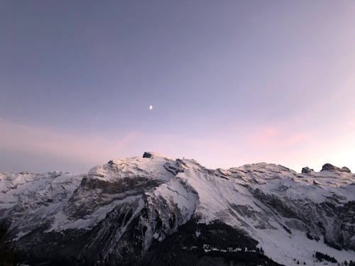 Snow Covered Mountain Under the Blue Sky