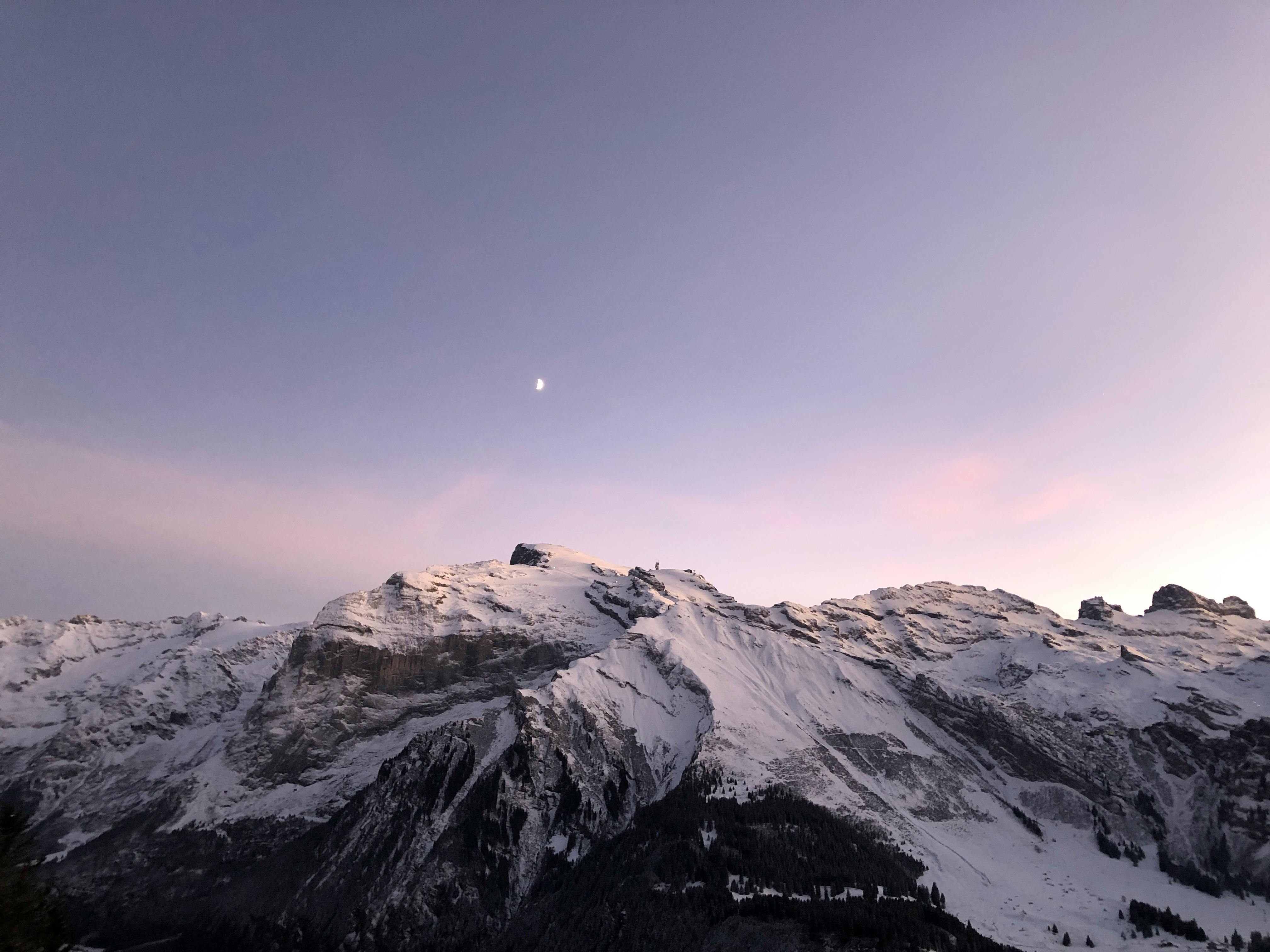 Orange and Gray Houses Near Snow Covered Mountain · Free Stock Photo