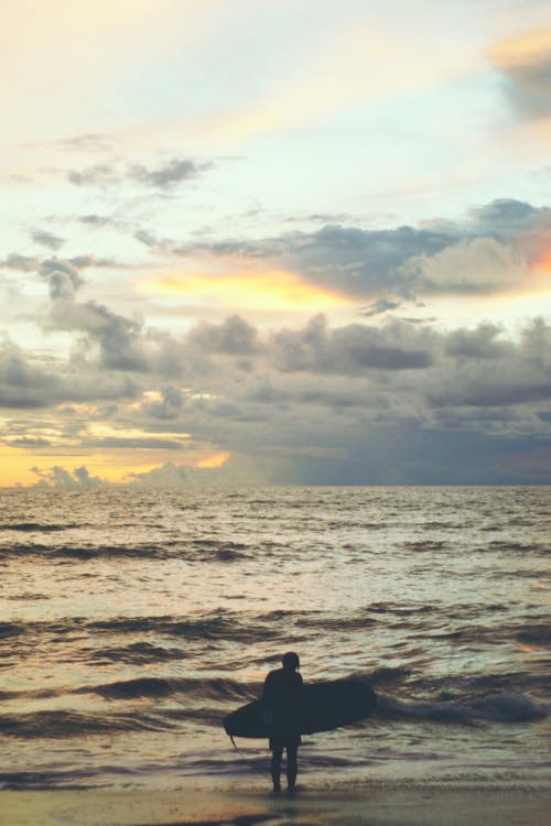 A Surfer at the Coast