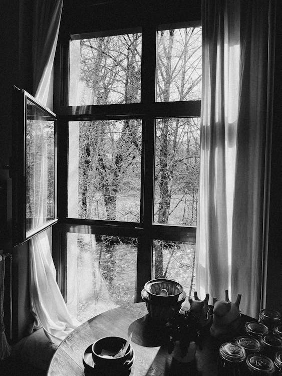 Free Grayscale Photo of Window With White Curtains Stock Photo