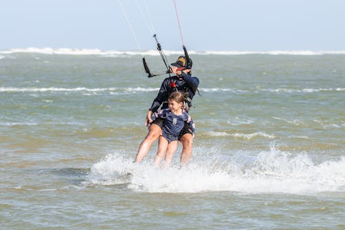 A Mother and Daughter Kitesurfing