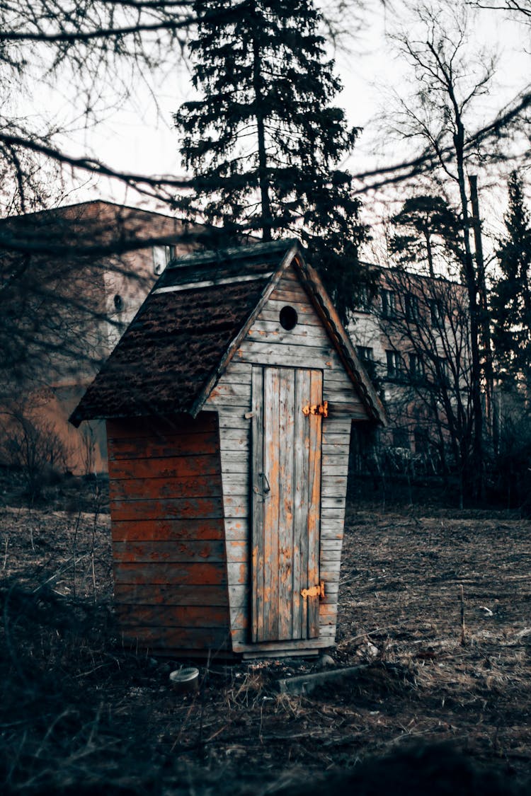 Photo Of A Wooden Outhouse