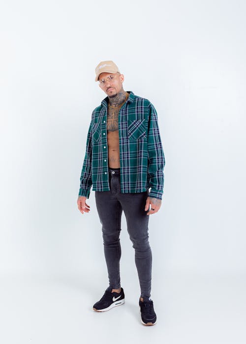 A Man in Green and White Plaid Button Up Long Sleeve Shirt