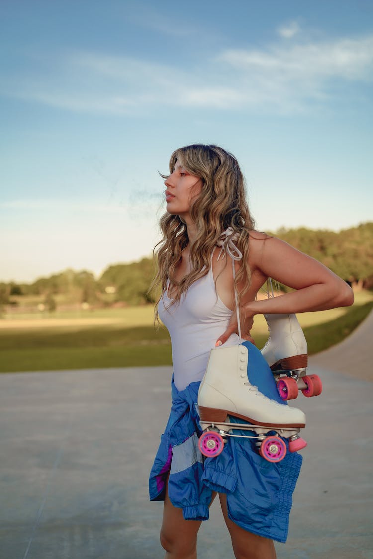 Photograph Of A Woman With Rollerblades