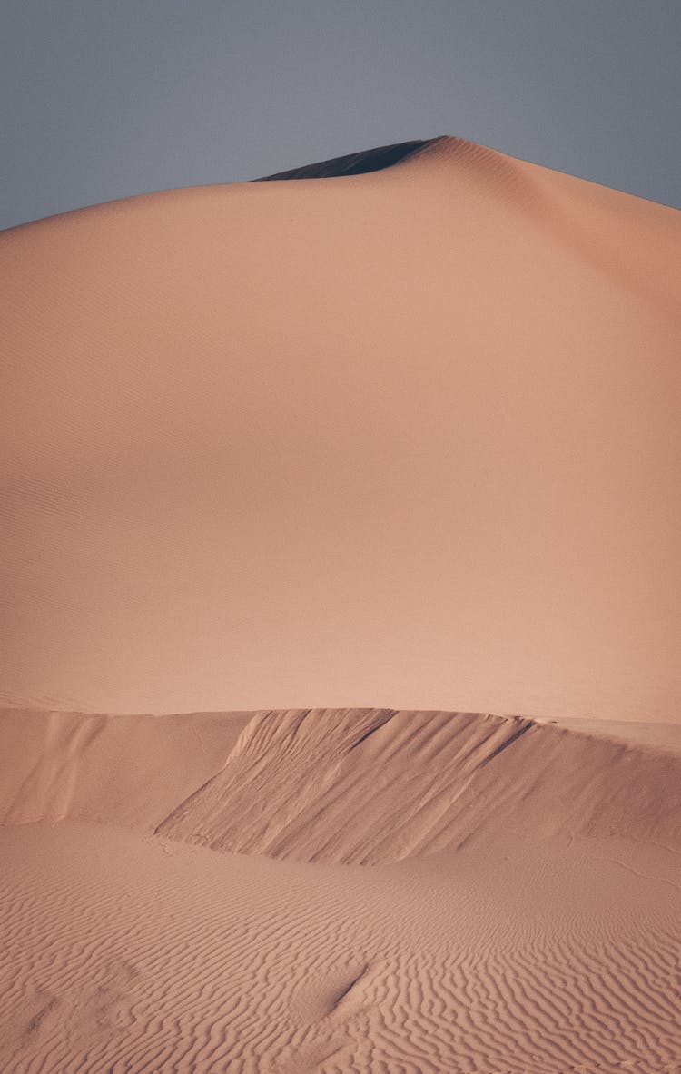 A Desert With Brown Sand