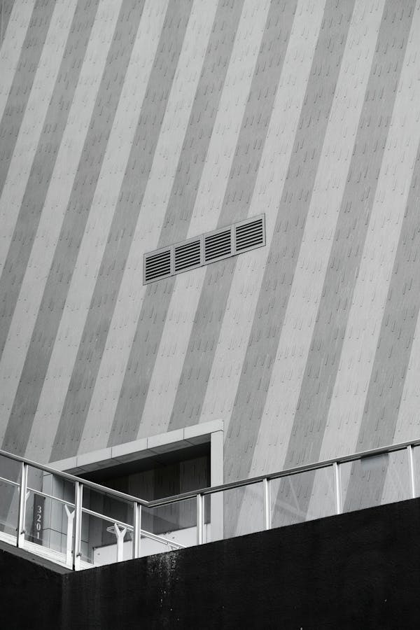 Person Showing Vent on Wall